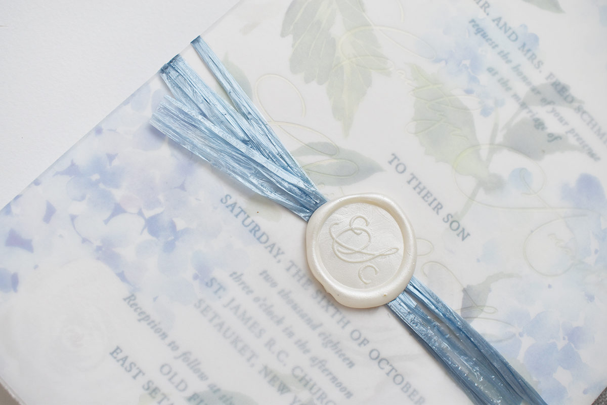 Hydrangea Watercolor Wedding Invitation, blue and silver color palette, blue raffia with ivory wax seal detail, monogram